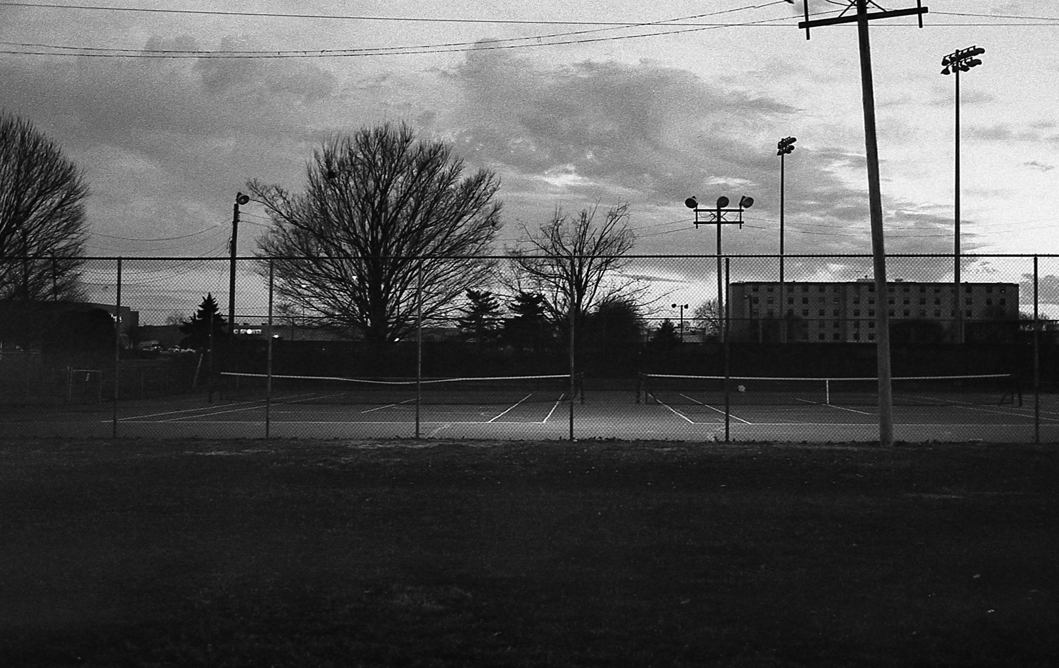 A tennis court in black and white.